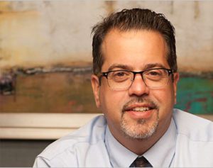 Rebalance biography of Joe Esparraguera, Chief Compliance Officer