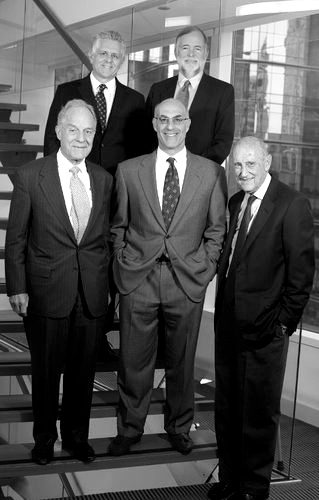 Mitch Tuchman, top left, with Jay Vivian, top right, and bottom row from left, Charles D. Ellis, co-founder Scott Puritz and Burton G. Malkiel.